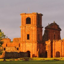 The eastern facade of the church of Sao Miguel at sunrise